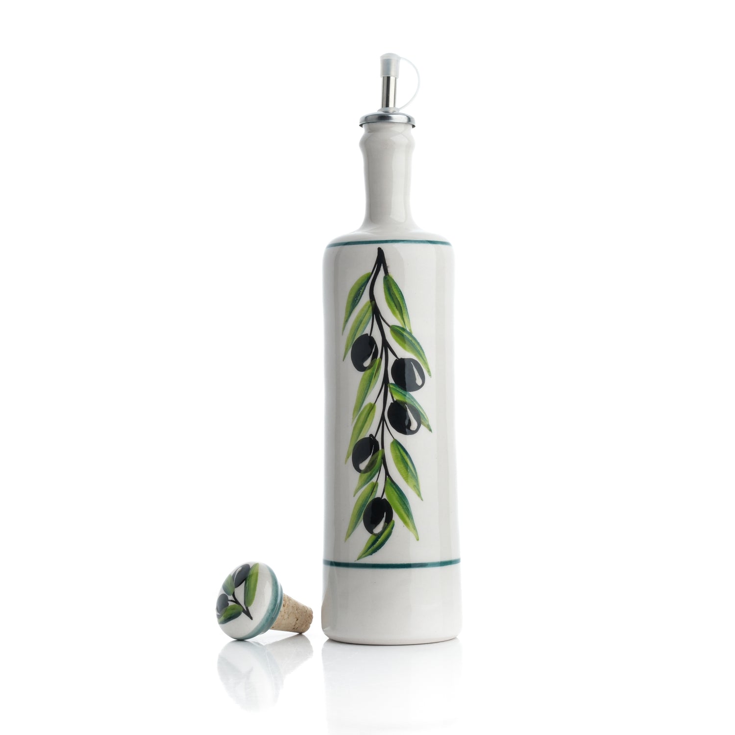A ceramic oil dispenser with a white body and green leaf patterns, alongside a cork stopper and a silicone pouring spout.