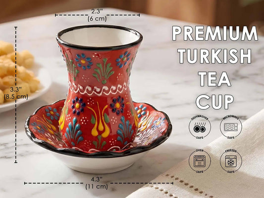 Decorative Turkish tea cup with floral patterns on a marble surface, with measurements and safety icons displayed.