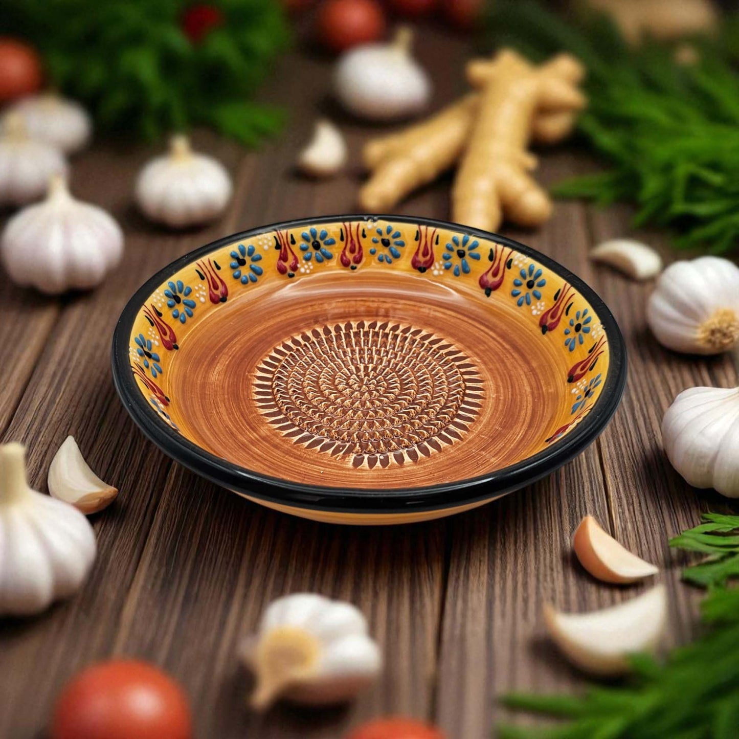 Handmade ceramic garlic grater bowl in Saffron Petals design. Large 7” size, perfect for garlic, ginger & spices. Bright artisan style, dishwasher safe.