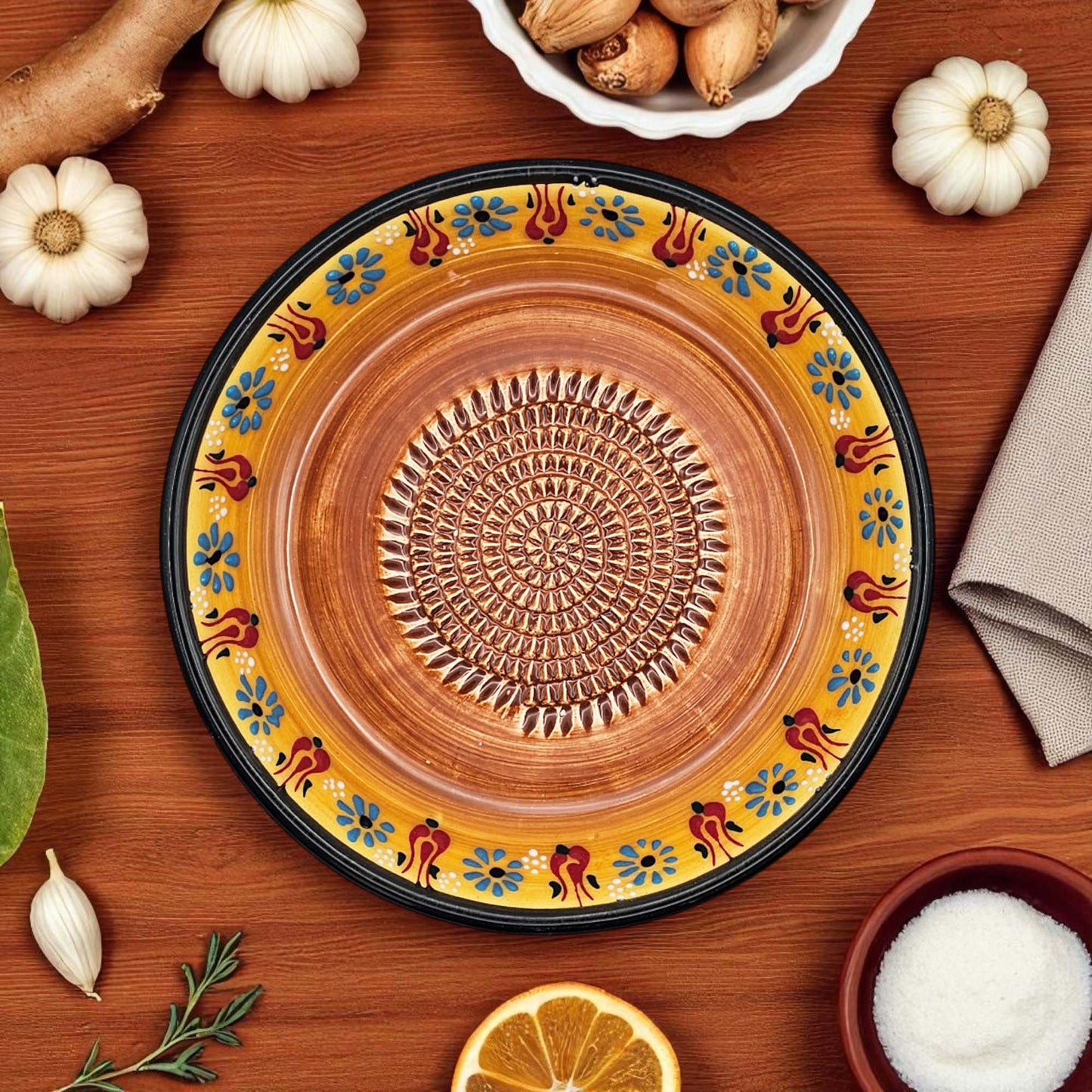 Handmade ceramic garlic grater bowl in Saffron Petals design. Large 7” size, perfect for garlic, ginger & spices. Bright artisan style, dishwasher safe.