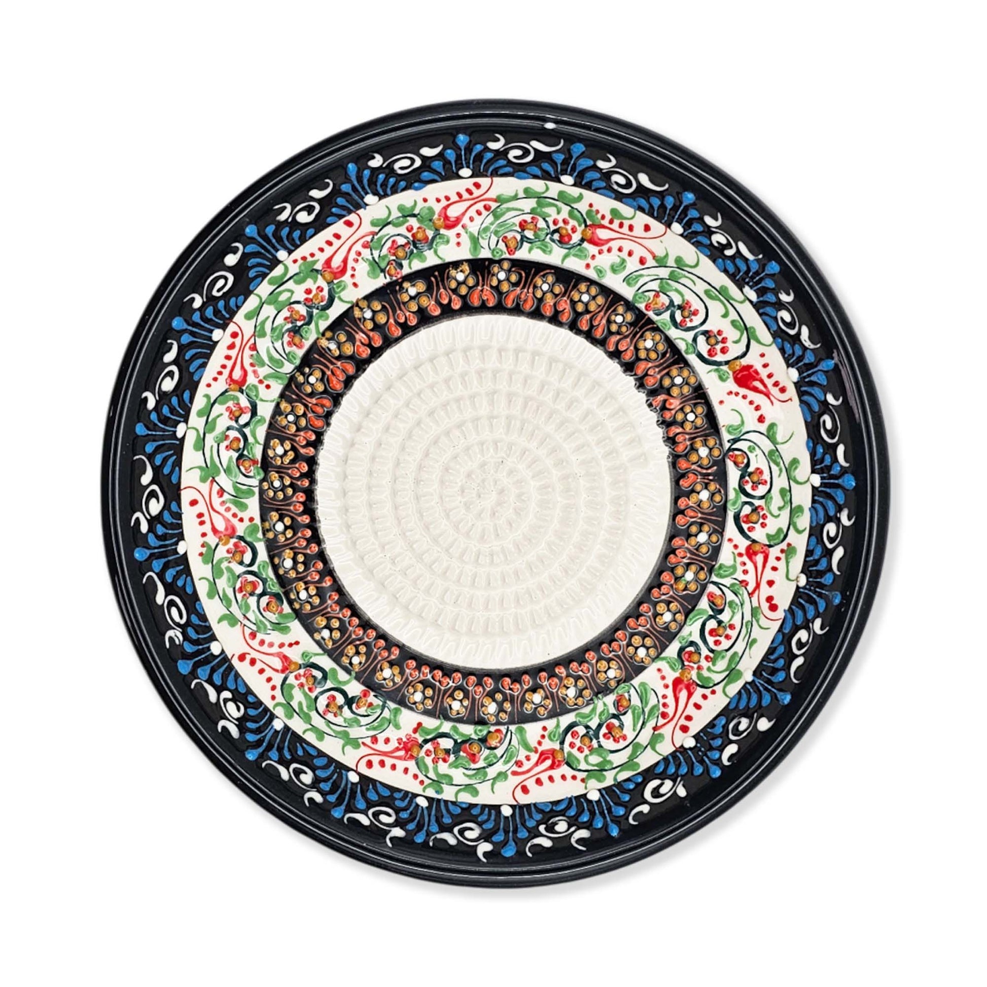 Decorative garlic grater bowl with colorful floral patterns on a white background