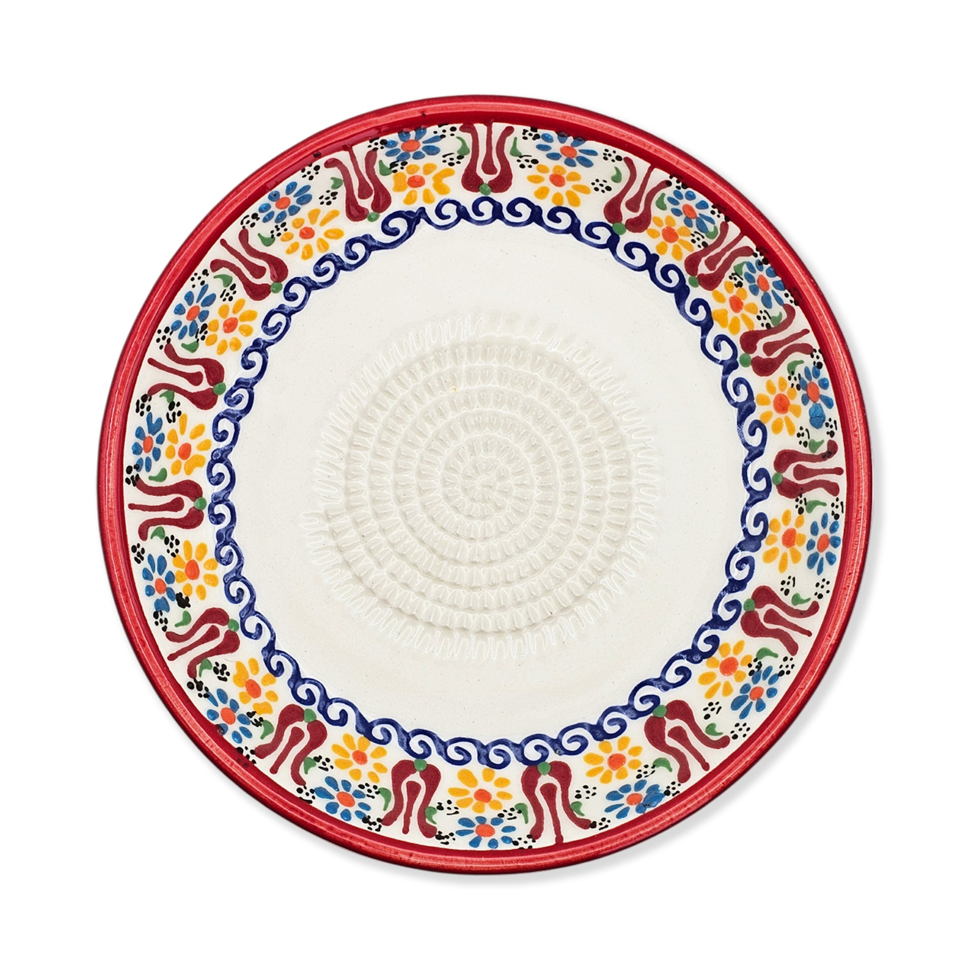 Decorative garlic grater bowl with colorful floral pattern on a white background