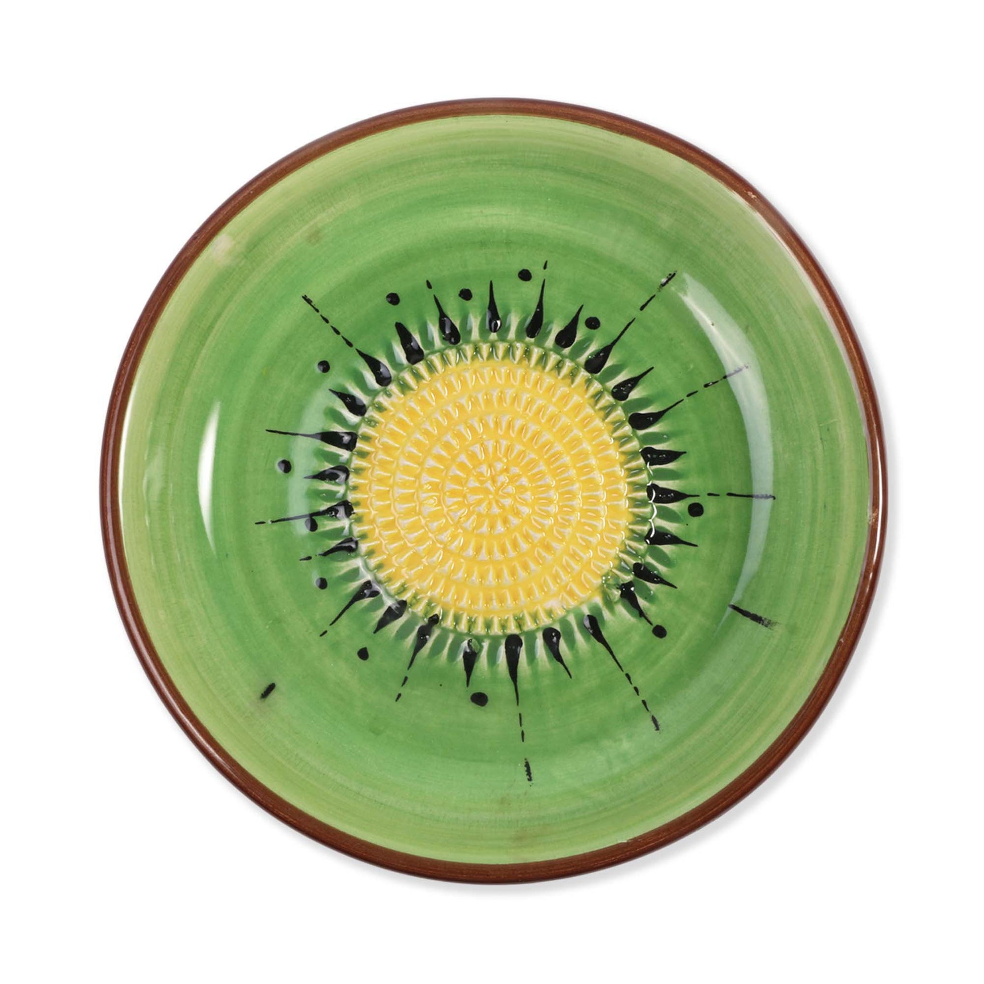 Ceramic garlic grater bowl with green rim and yellow center featuring black abstract design on a white background