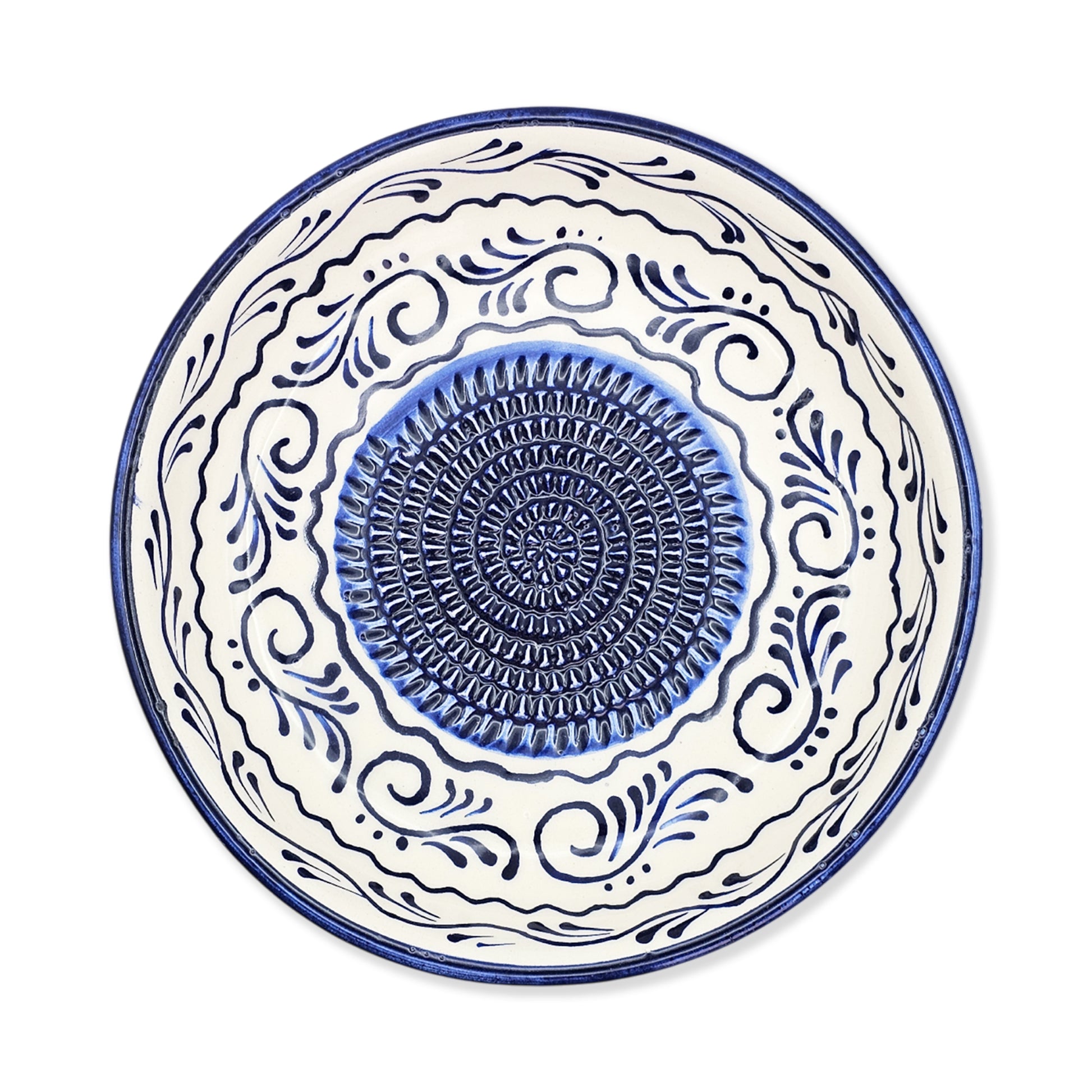 Ceramic garlic grater bowl with blue and white decorative patterns on a white background