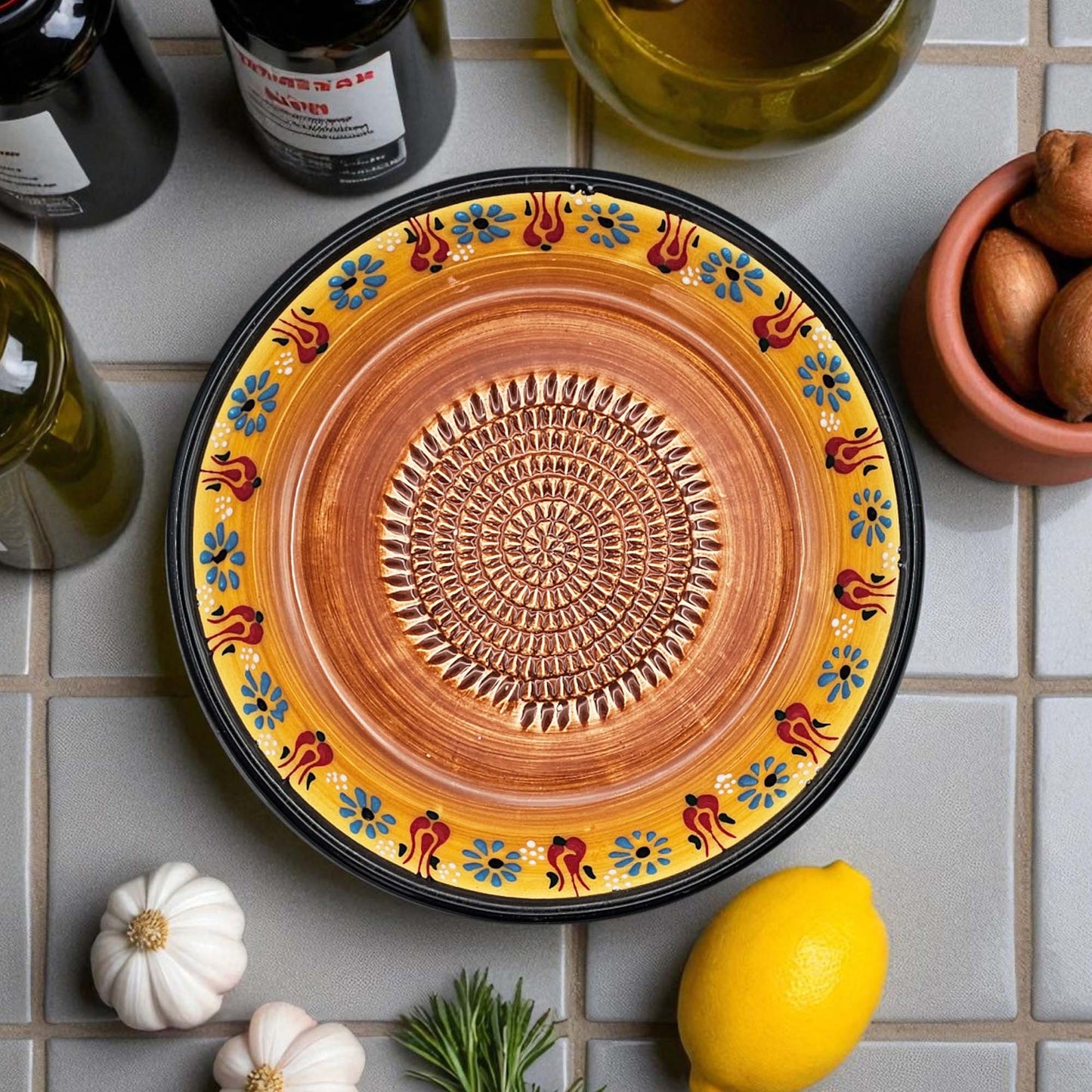 Handmade ceramic garlic grater bowl in Saffron Petals design. Large 7” size, perfect for garlic, ginger & spices. Bright artisan style, dishwasher safe.