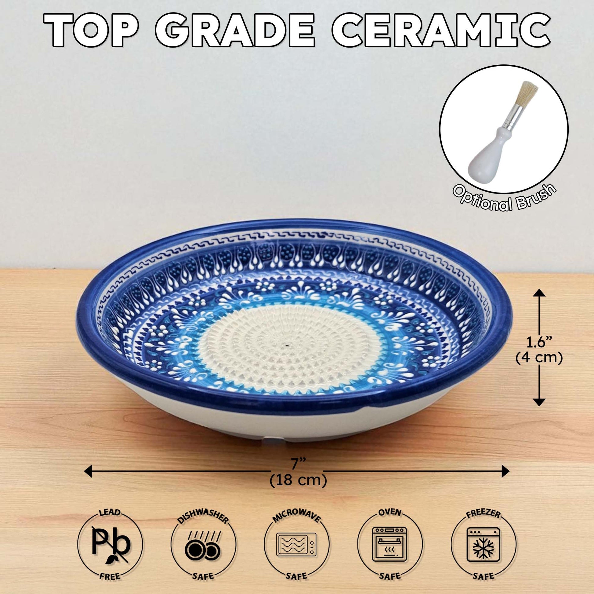 Top grade ceramic garlic grater bowl with blue and white design on a wooden surface, featuring dimensions and safety icons.