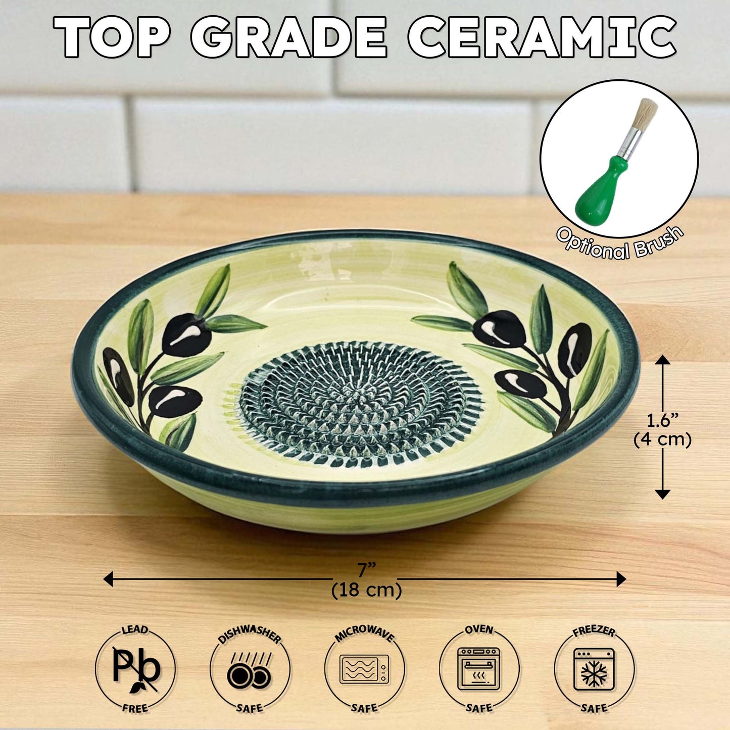 Ceramic garlic grater bowl with olive design on a wooden surface, featuring dimensions and safety icons.