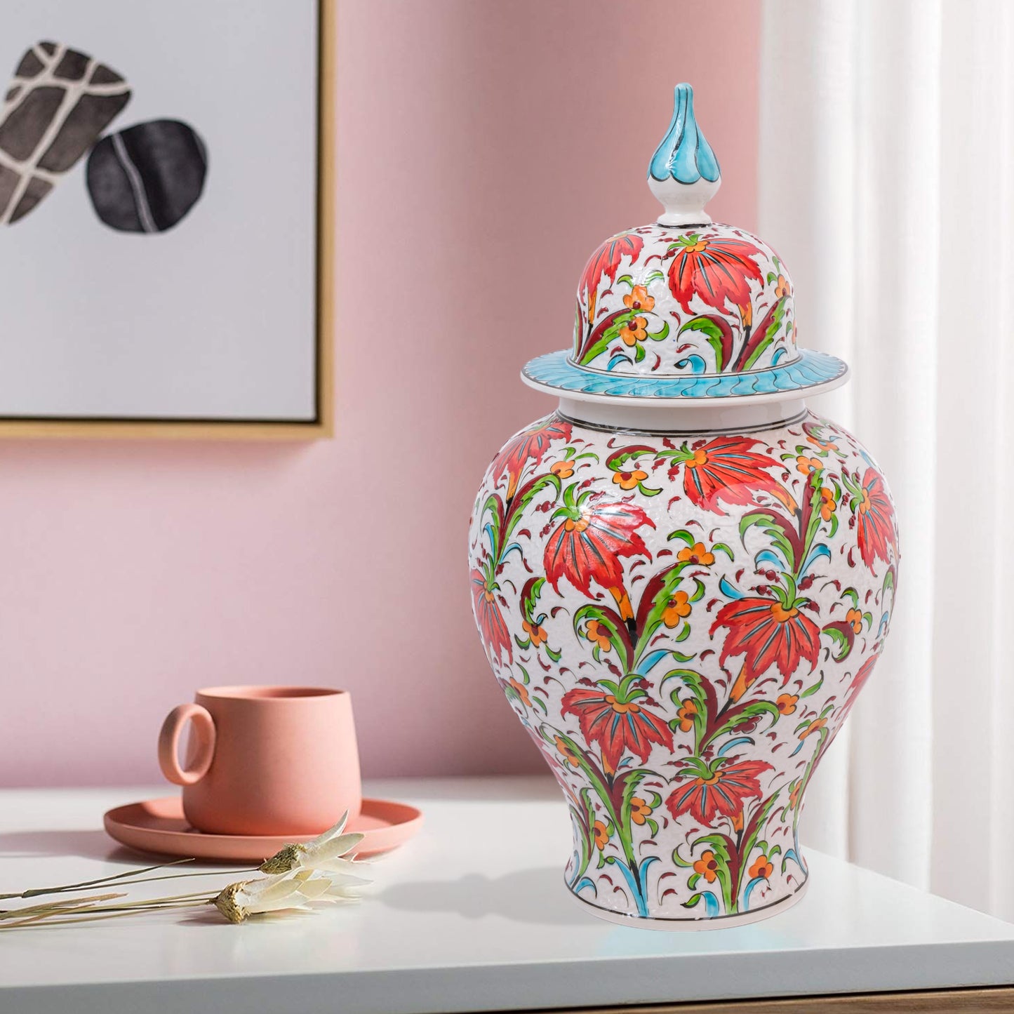 Hand-painted Tulip Garden ceramic jar with vivid red tulips, yellow blossoms & green foliage. Lidded artisan jar with turquoise finial, perfect décor or gift.