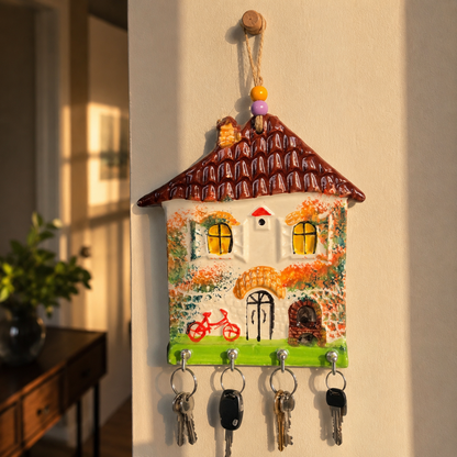 Rustic brown roof ceramic house key holder in a spring entryway