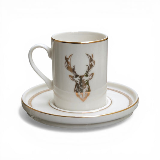 Porcelain cup and saucer set with deer design on a white background