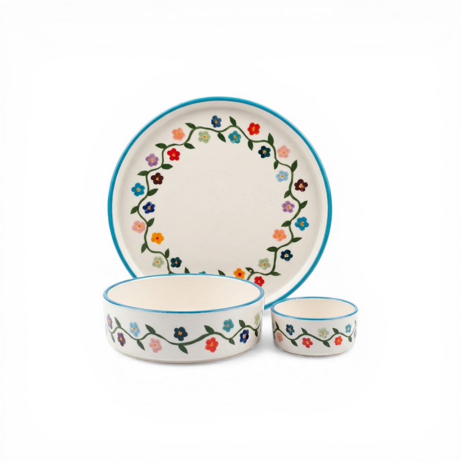 Ceramic dinnerware set with floral design on a white background