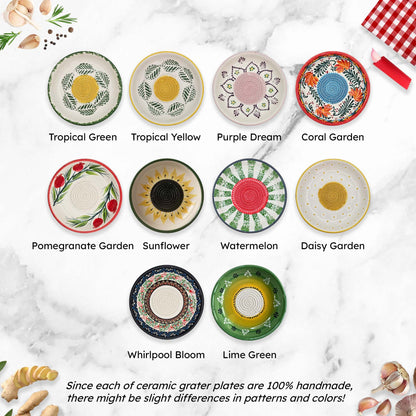 Collection of ceramic grater bowls with various patterns on a marble surface.