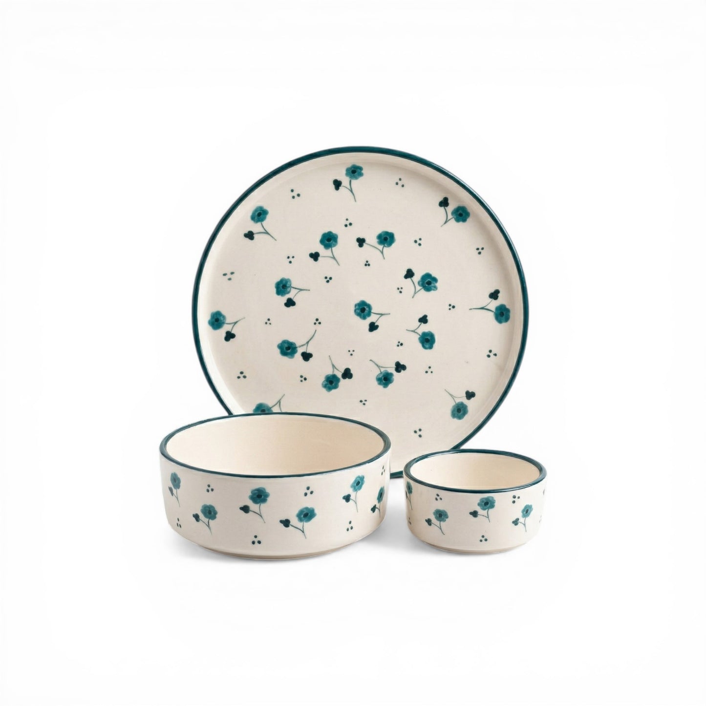 Ceramic dinnerware set with floral pattern on a white background