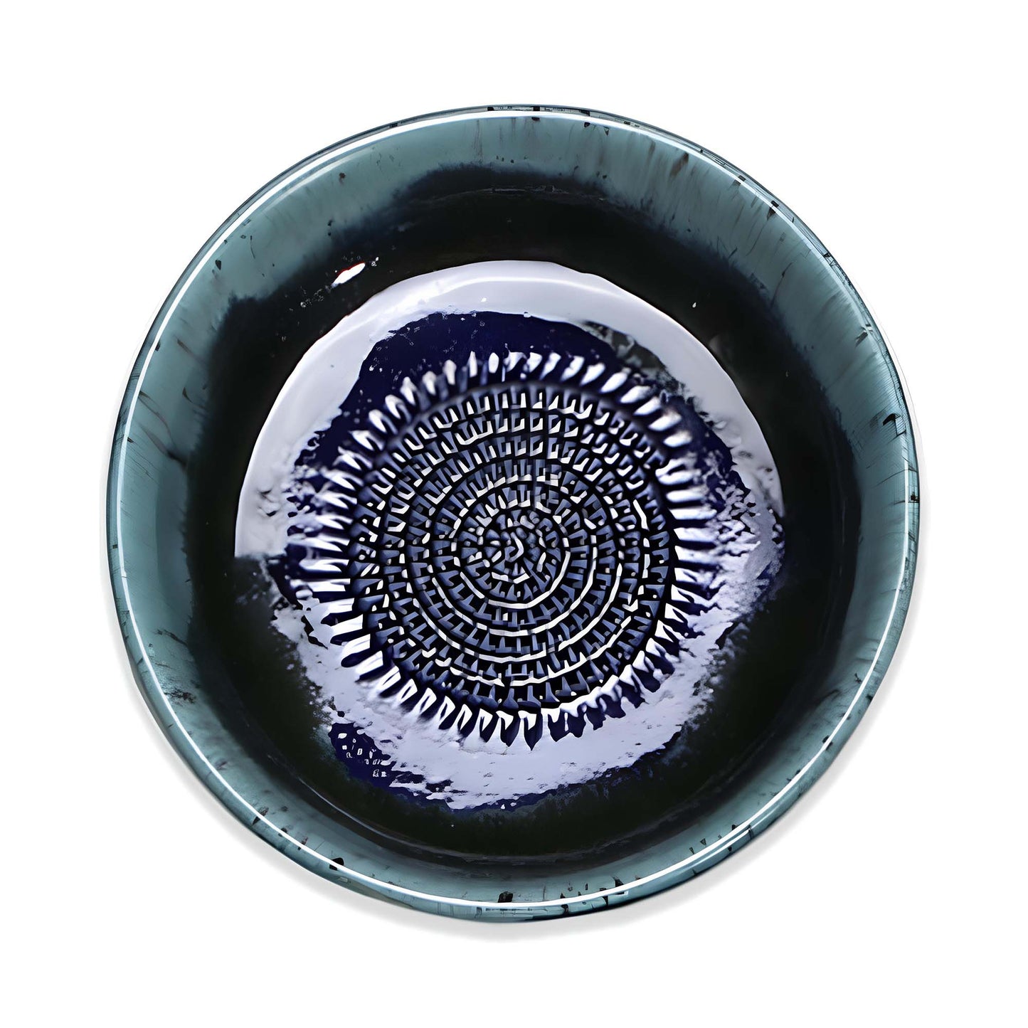 Ceramic garlic grater bowl with decorative pattern on a white background