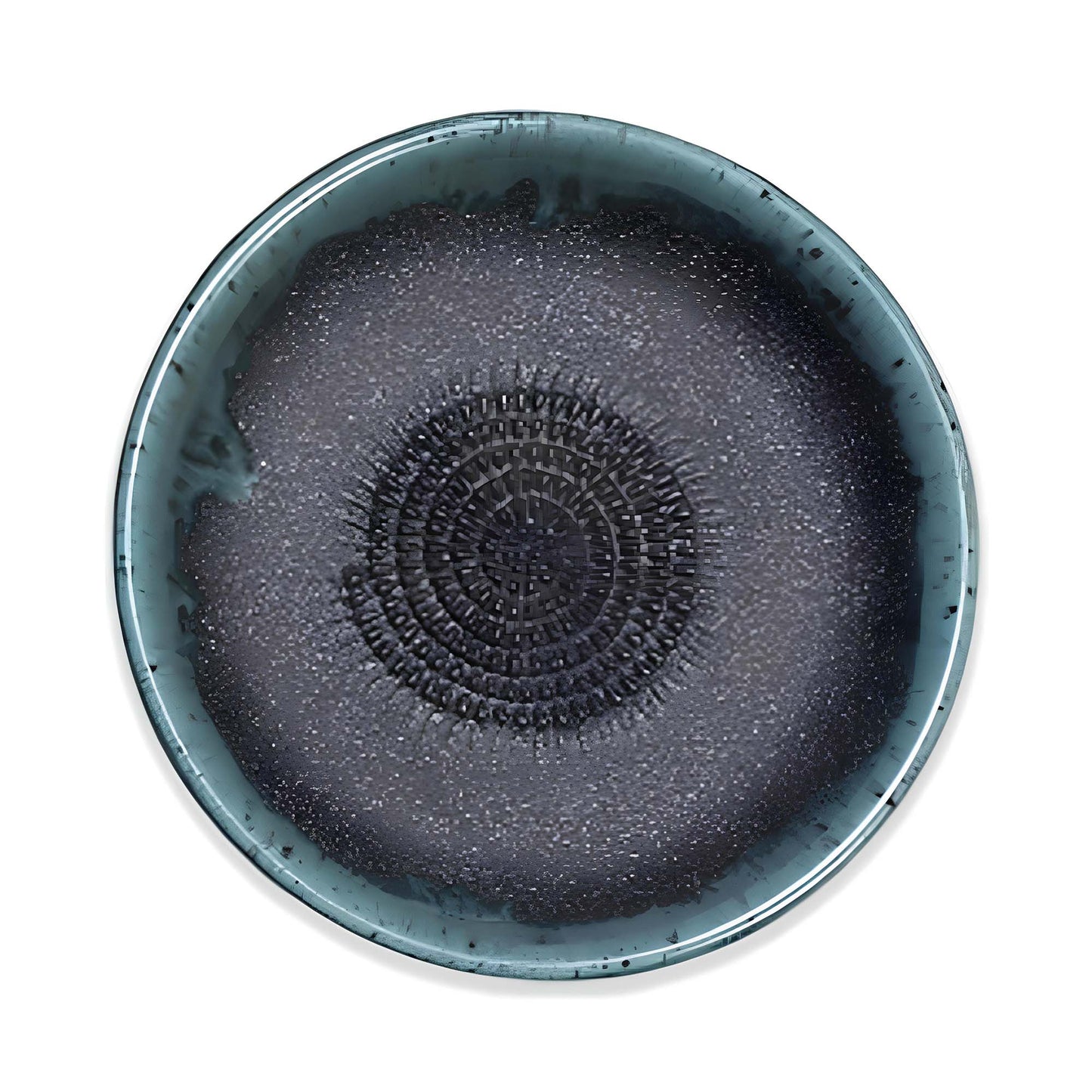 Round ceramic garlic grater bowl with textured design on a white background