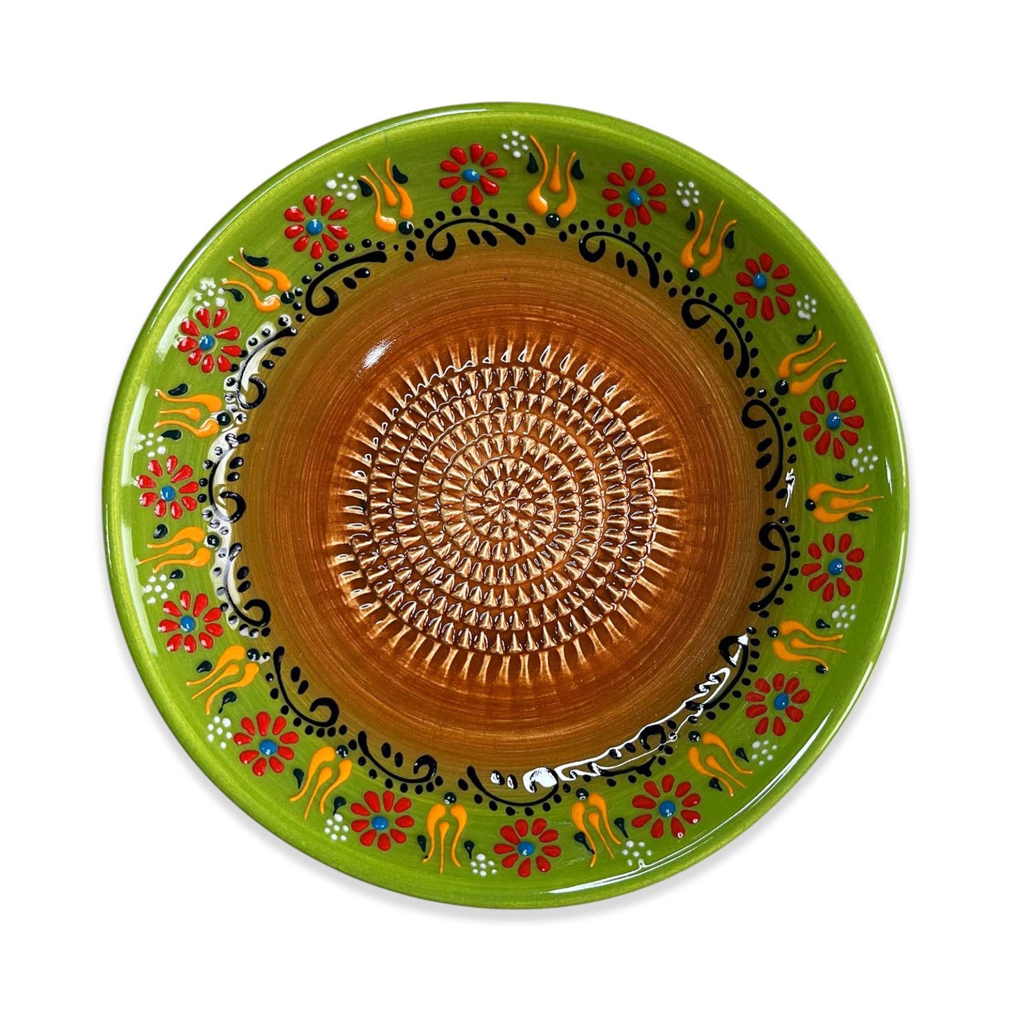 Decorative ceramic garlic grater bowl with green rim and brown center, featuring floral and abstract patterns.