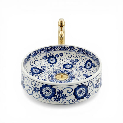 Ceramic sink with blue floral patterns on a white background