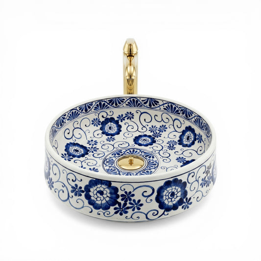 Ceramic sink with blue floral patterns on a white background