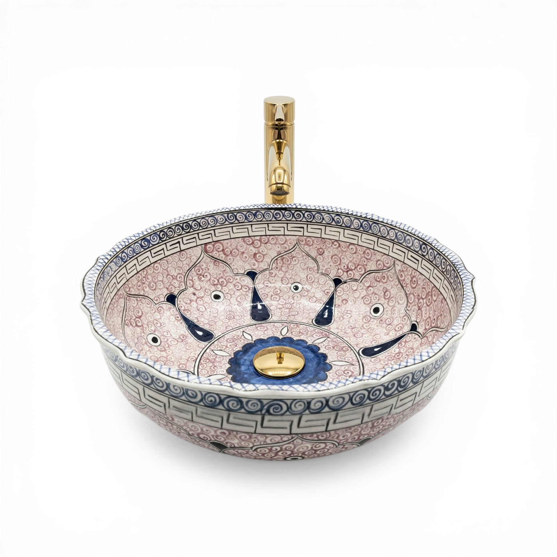 Decorative ceramic sink with artistic design on a white background