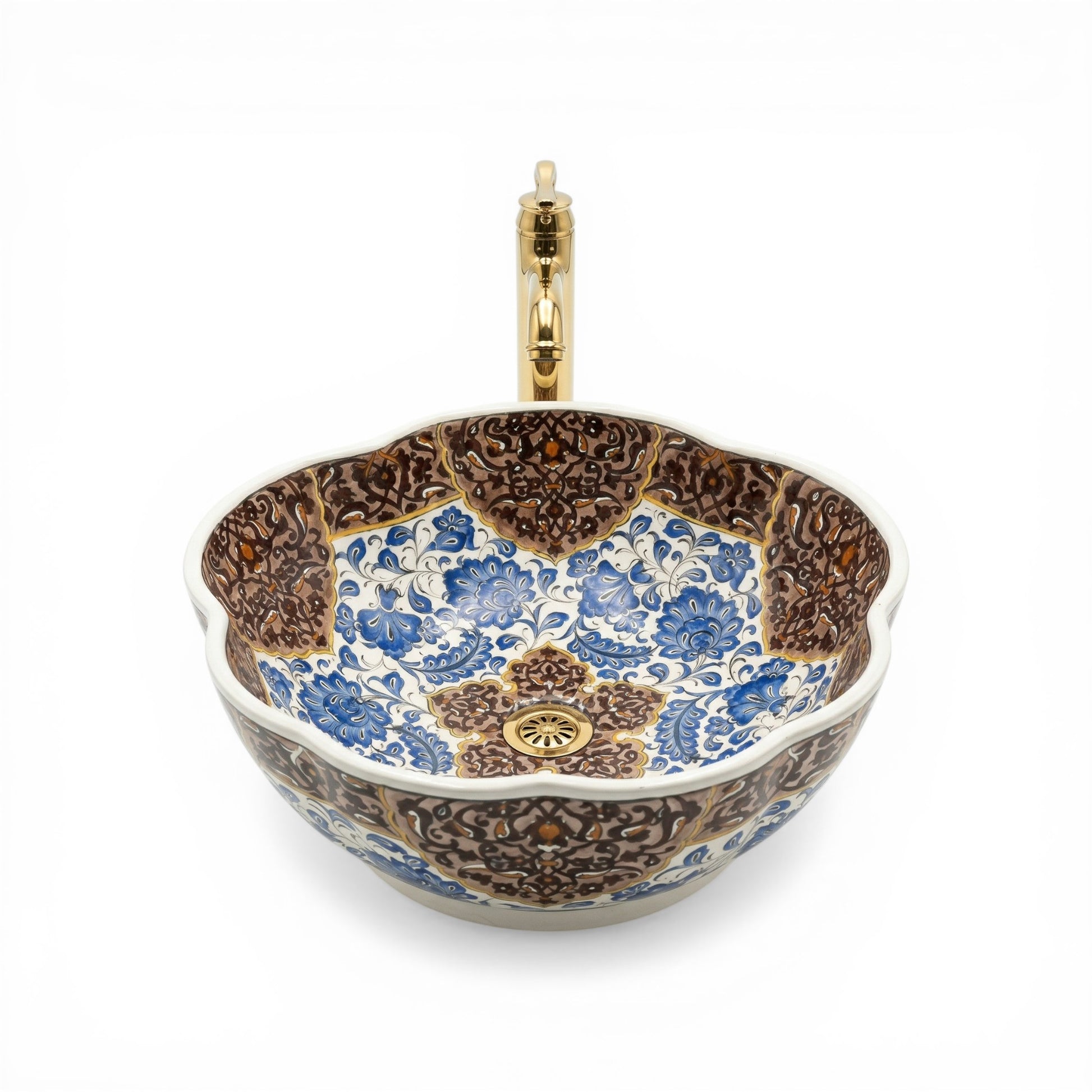 Decorative ceramic sink with floral patterns on a white background