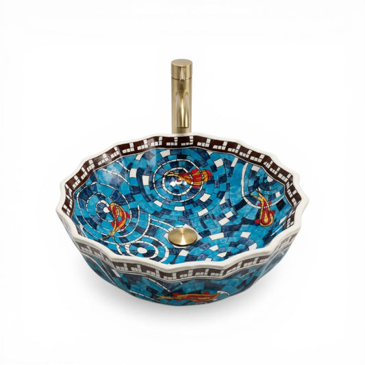 Decorative mosaic sink with blue and multicolor design on a white background