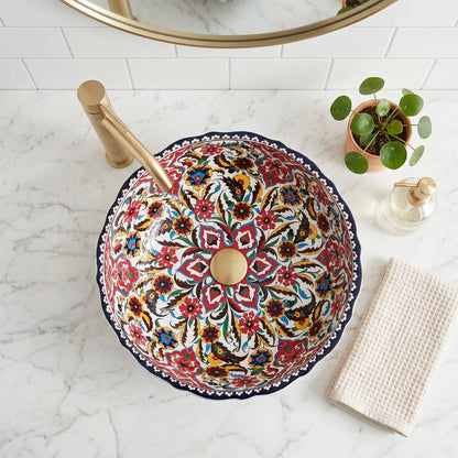 Decorative sink with floral pattern on a marble countertop