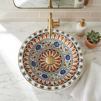Decorative ceramic sink with floral patterns in a bathroom setting