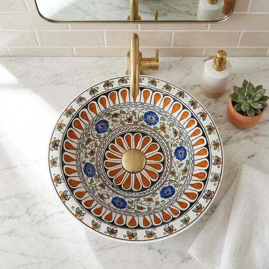 Decorative ceramic sink with floral patterns in a bathroom setting