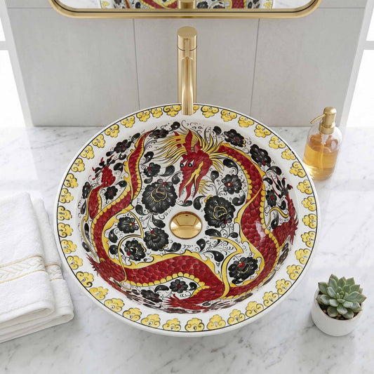 Decorative bathroom sink with dragon design on a marble countertop