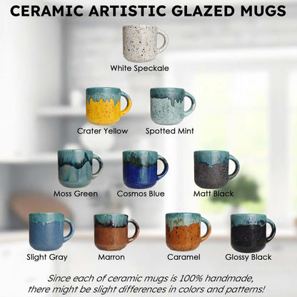 Collection of ceramic mugs with various artistic glaze patterns on a blurred background.