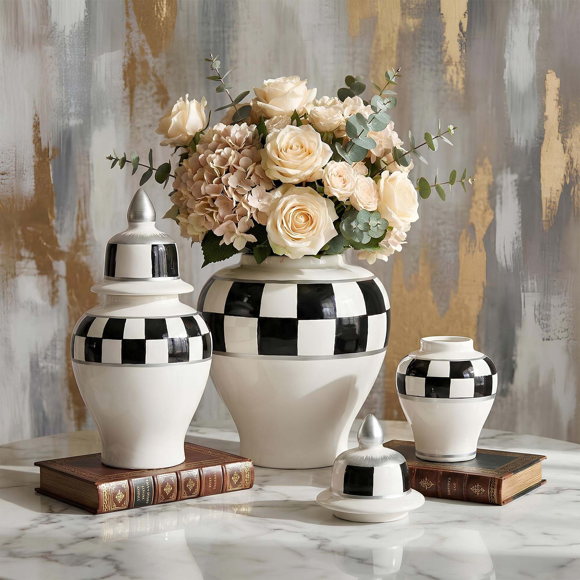 Decorative jars with checkered patterns on a marble surface with a floral arrangement in the center.