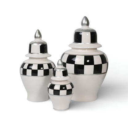 Set of three decorative jars with checkered pattern and metallic lids on a white background