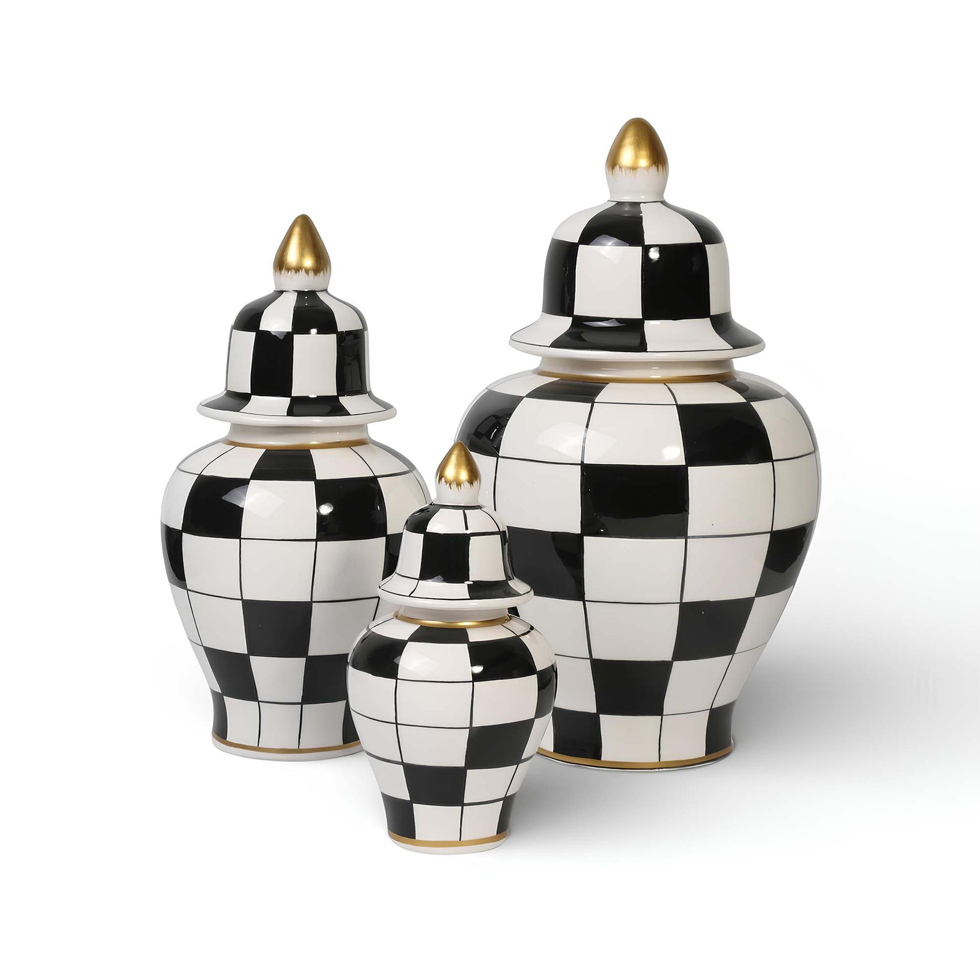 Set of three black and white checkered jars with gold accents on a white background