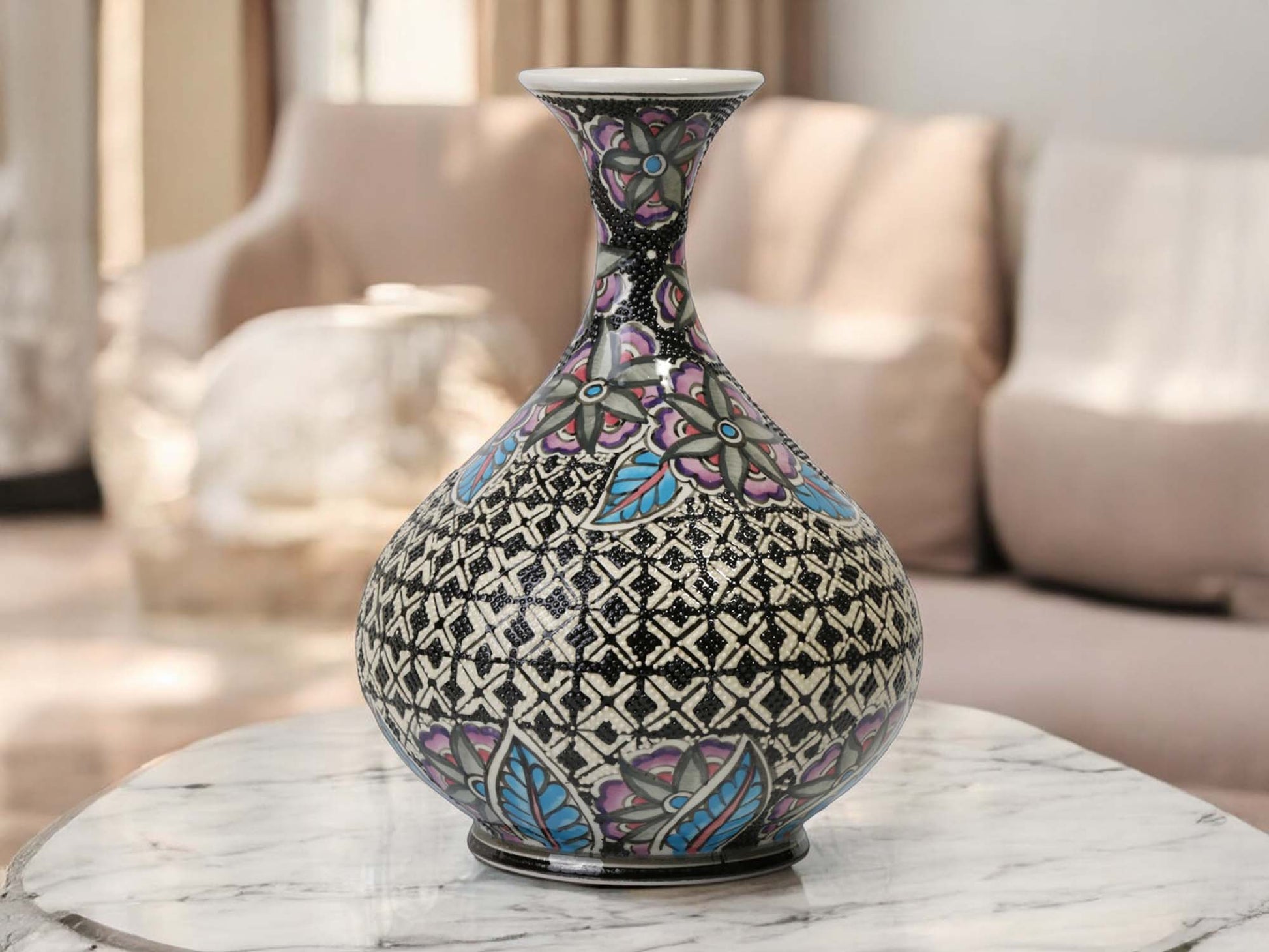 Decorative vase with geometric pattern on a marble surface in a living room setting