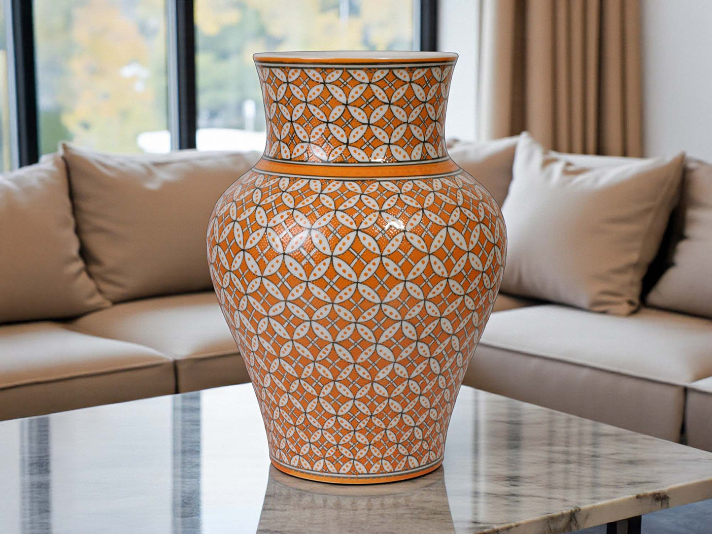 Decorative vase with geometric pattern on a table in a living room setting