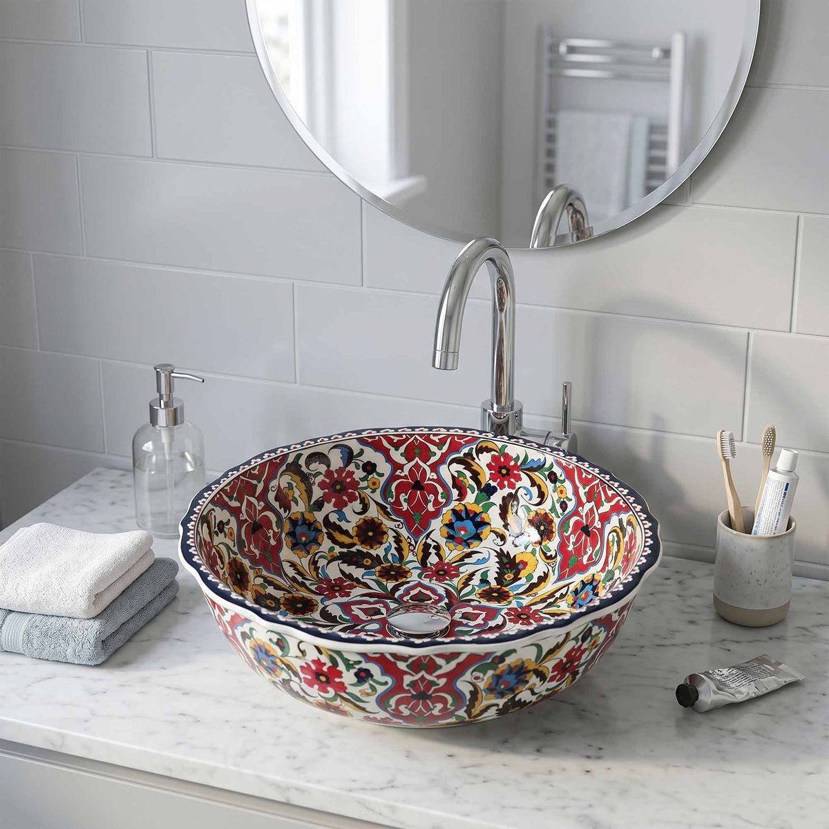 Decorative sink with floral patterns in a bathroom setting