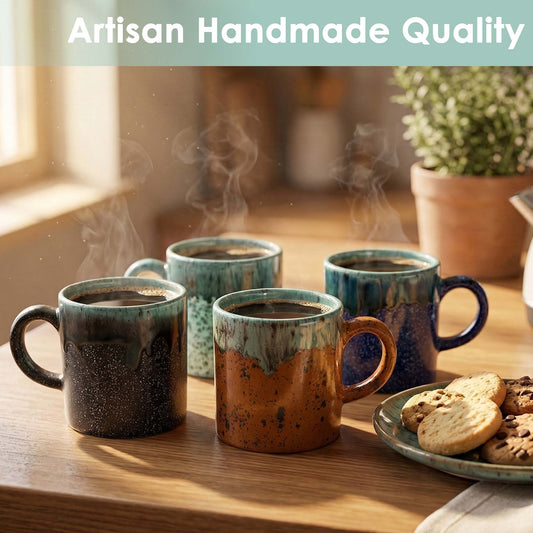 Four ceramic mugs on a wooden table with steam rising, accompanied by a plate of cookies.
