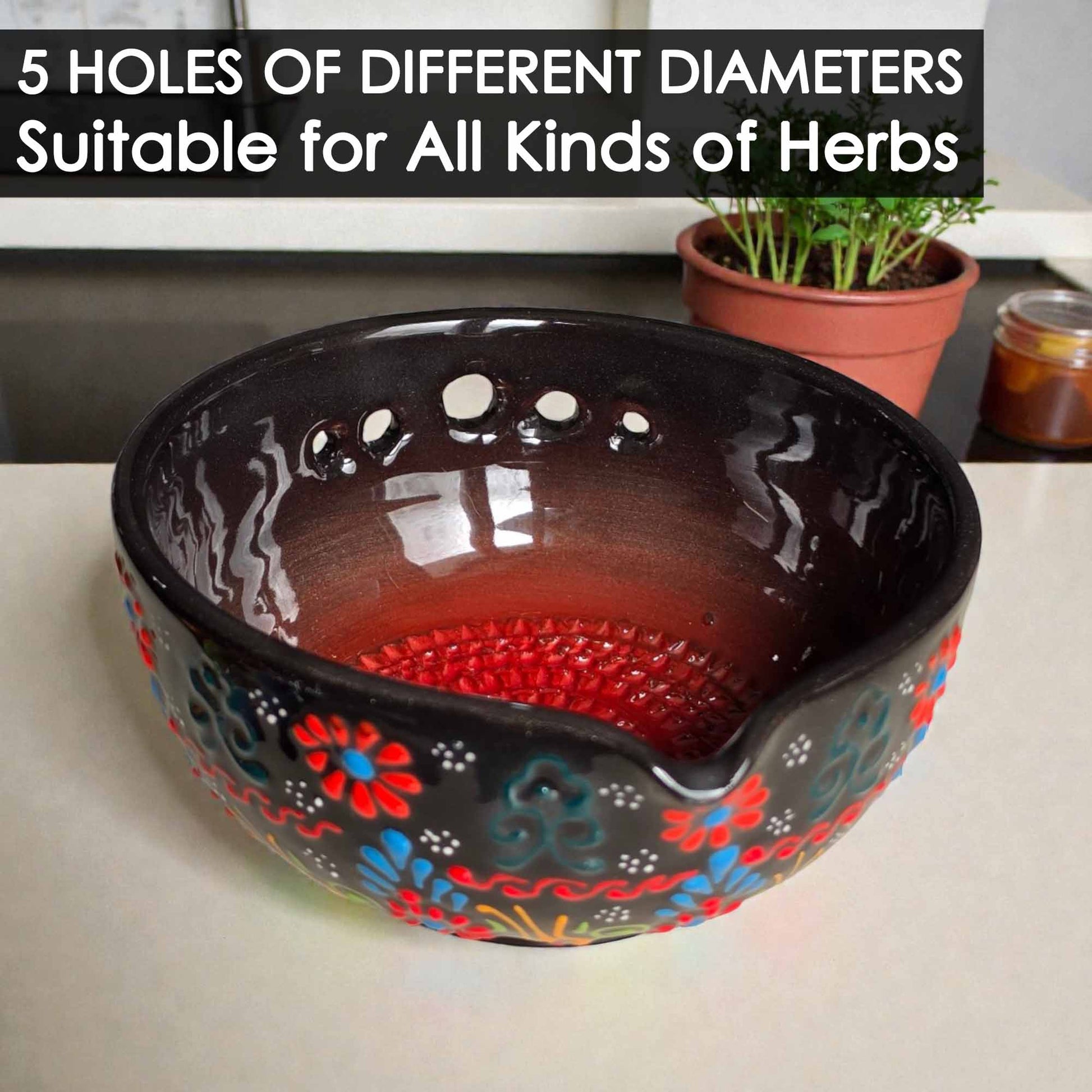 Decorative ceramic herb stripping bowl with floral patterns on a table, text indicating different hole sizes for herbs.