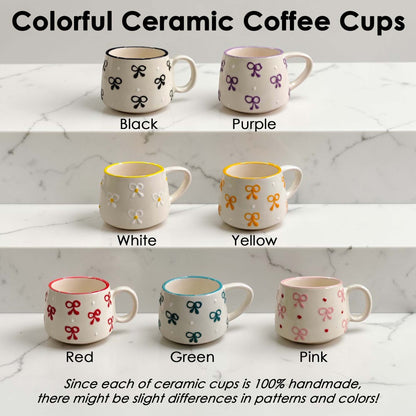 Colorful ceramic coffee cups in various patterns and colors on a marble surface.