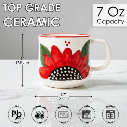 Ceramic mug with floral design and safety icons on a gray background