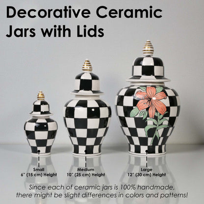 Decorative ceramic jars with lids of different sizes on a gray background