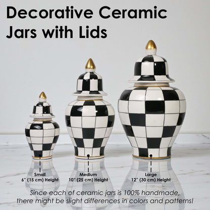 Decorative ceramic jars with lids in black and white checkered pattern on a light background