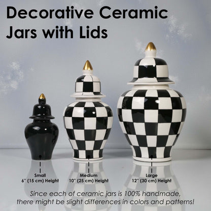 Decorative ceramic jars with lids in black and white checkered pattern on a gray background