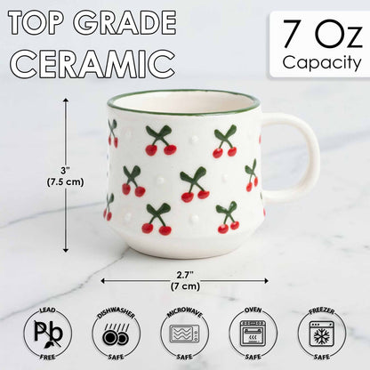 Ceramic mug with cherry design and safety icons on a white background