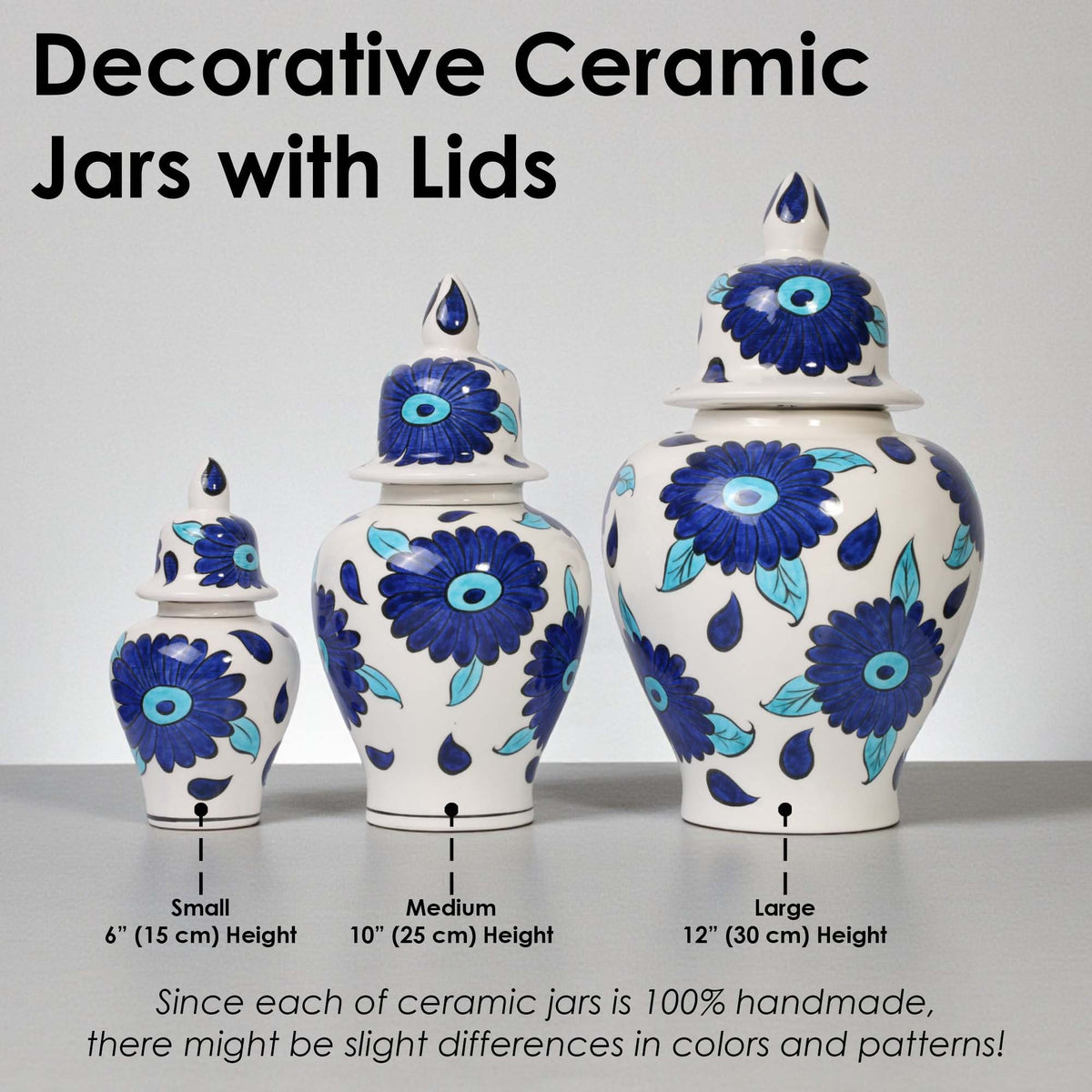 Decorative ceramic jars with lids of different sizes on a gray surface.
