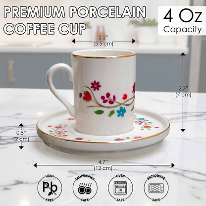White porcelain coffee cup with floral design on a saucer, with measurements and safety icons displayed.
