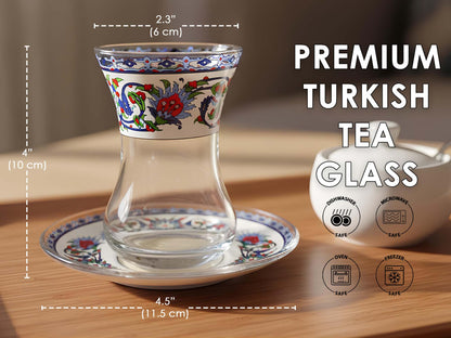 Turkish tea glass with floral design and measurements on a wooden surface