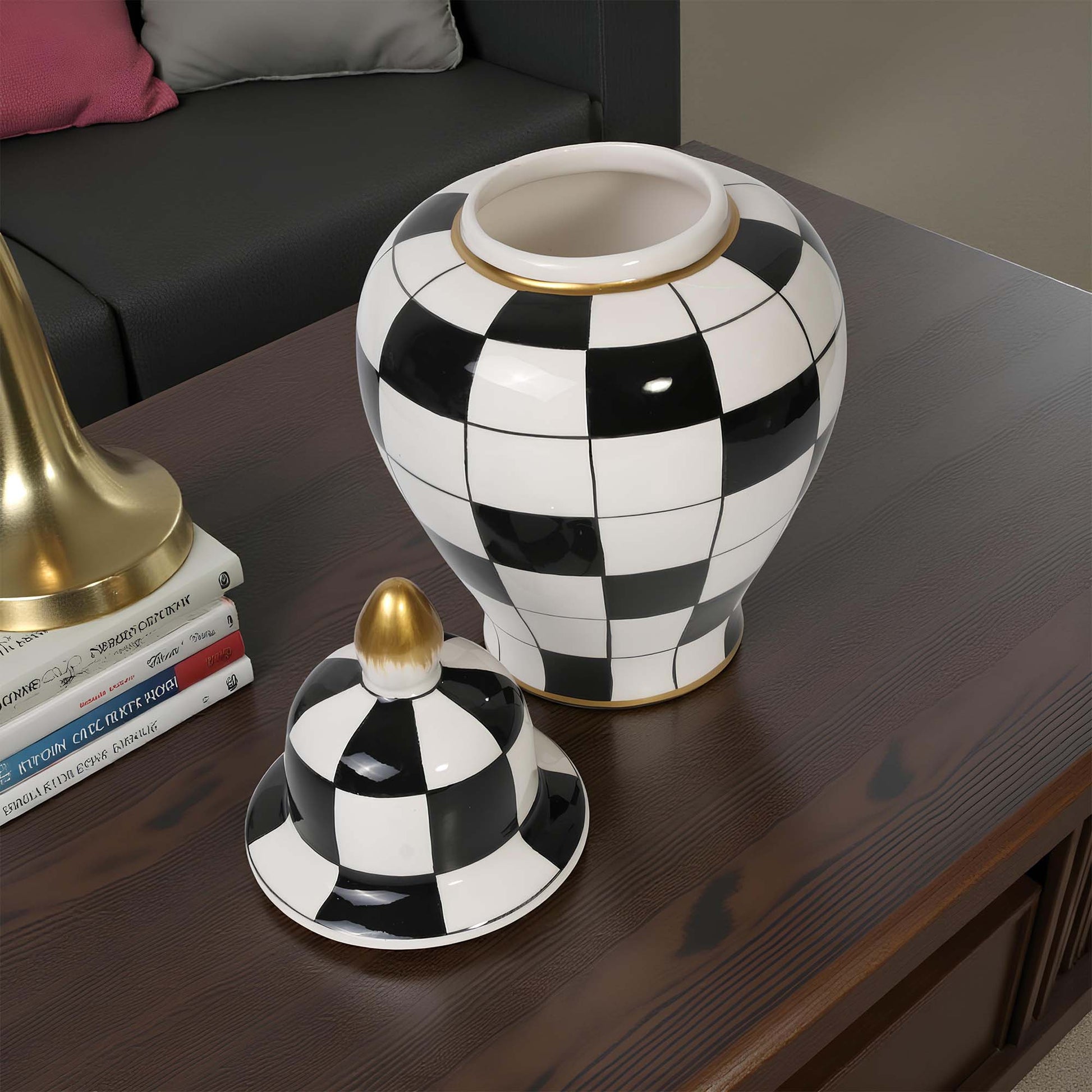 Black and white checkered jar with gold accents on a wooden surface