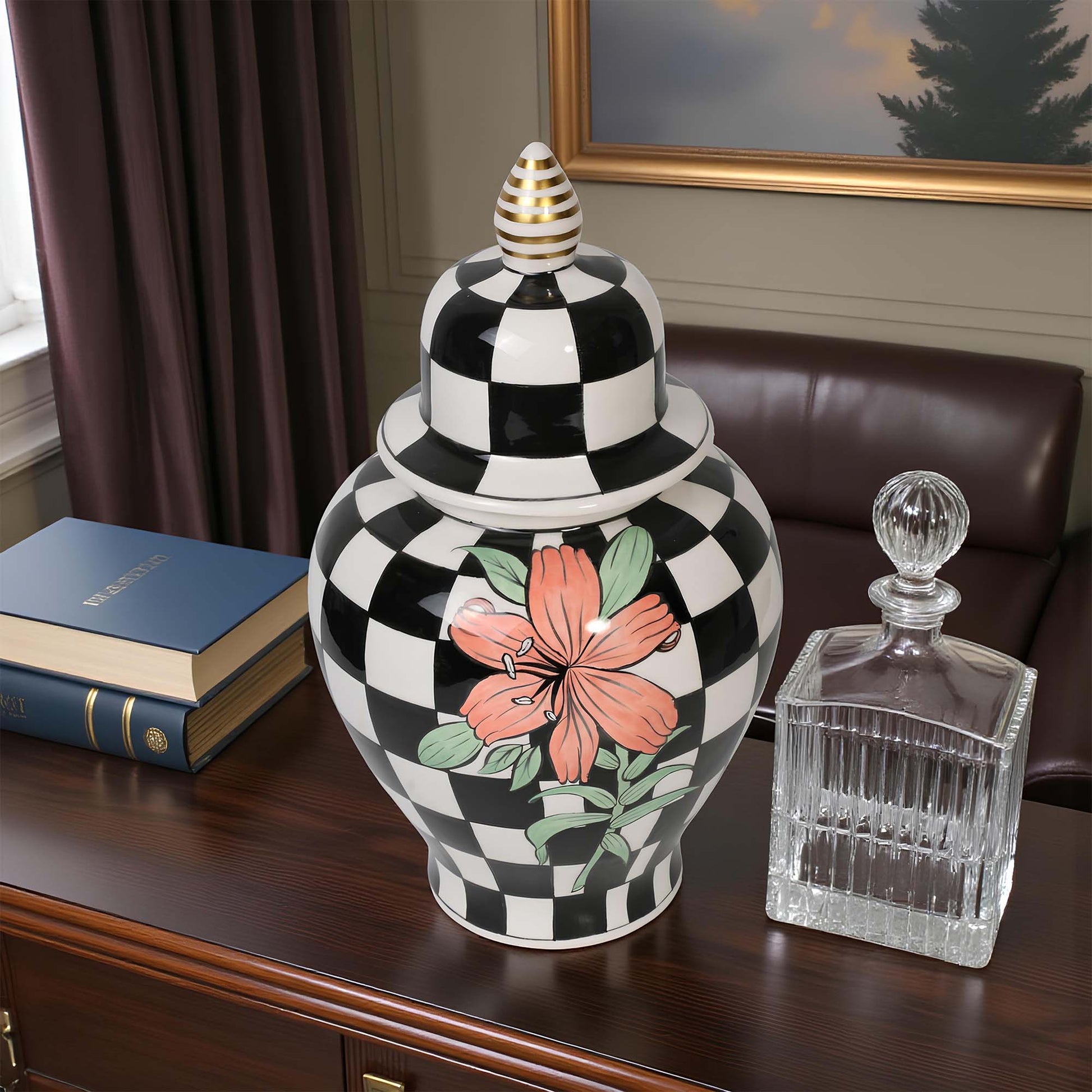 Decorative jar with black and white checkered pattern and floral design on a wooden surface.
