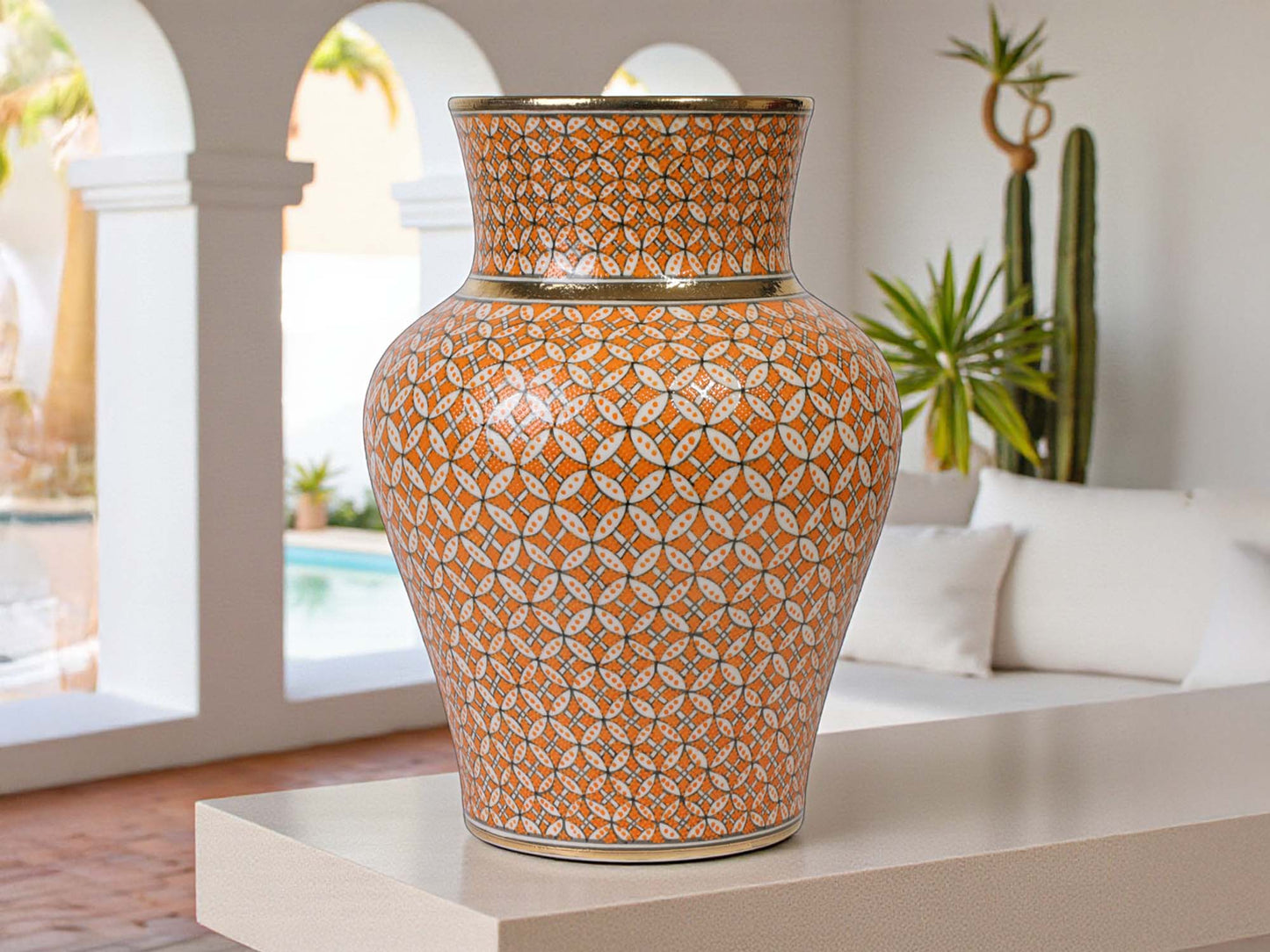 Decorative vase with geometric pattern on a table in an outdoor setting